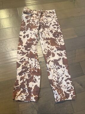 We The Free Risk Taker Cow Print straight Leg denim in Brown and White